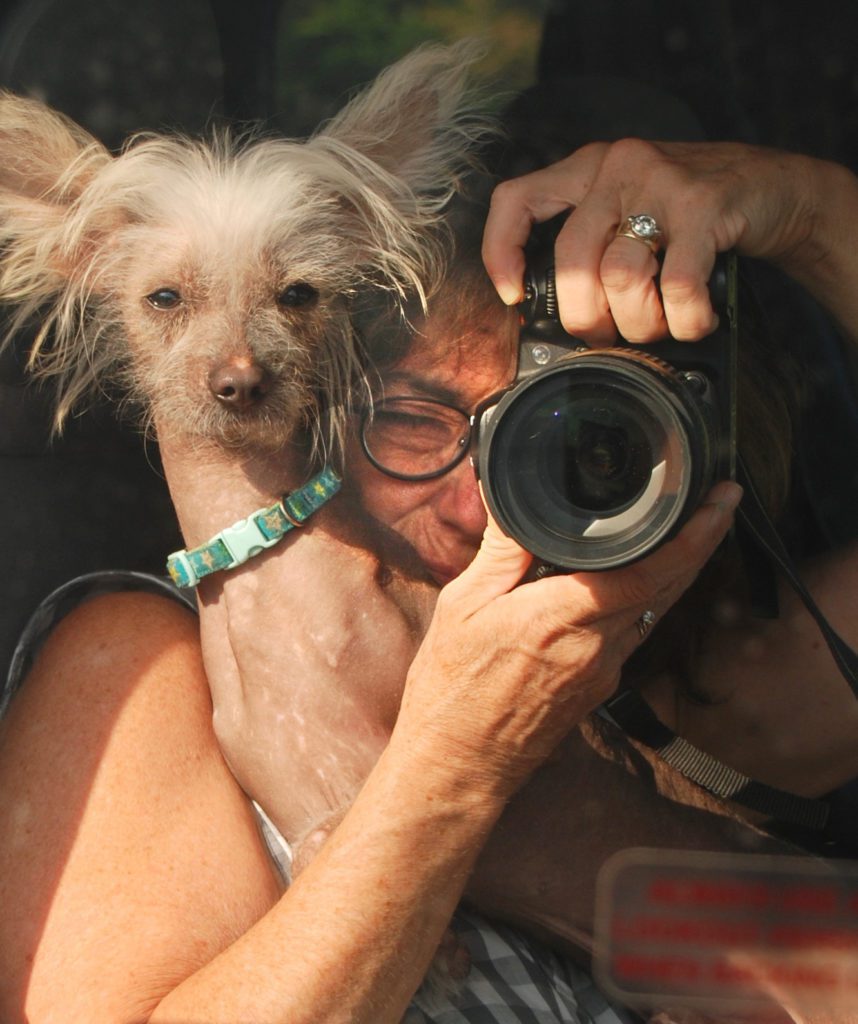 A women with her pet having a photography